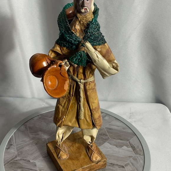 Handcrafted Artisan Figurine with Orange and Green Accents - Picture 12 of 14